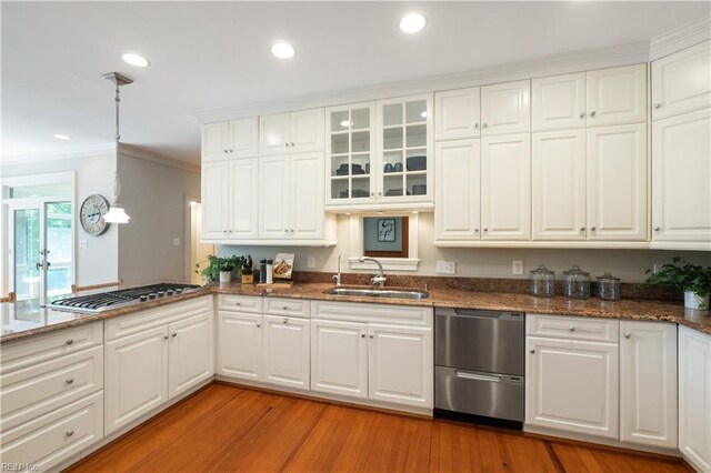 1263 Murphys Mill Rd, Suffolk, VA 23434 - kitchen featuring a sink, dark stone countertops, light wood finished floors, stainless steel appliances, and white cabinetry