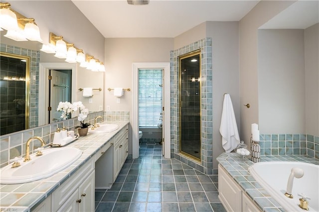 1263 Murphys Mill Rd, Suffolk, VA 23434 - bathroom featuring a sink, a shower stall, toilet, and double vanity
