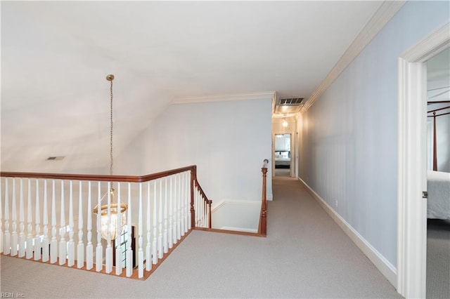 1263 Murphys Mill Rd, Suffolk, VA 23434 - hallway featuring carpet flooring, crown molding, visible vents, and an upstairs landing