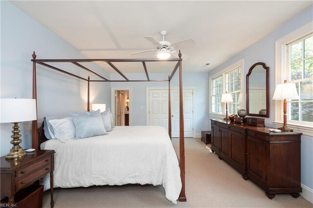 1263 Murphys Mill Rd, Suffolk, VA 23434 - bedroom with ceiling fan, light carpet, and baseboards