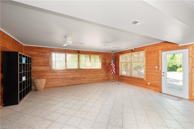 1263 Murphys Mill Rd, Suffolk, VA 23434 - empty room featuring wooden walls, ceiling fan, and visible vents