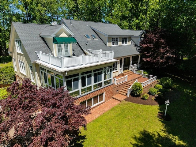 1263 Murphys Mill Rd, Suffolk, VA 23434 - back of house with a shingled roof, a yard, and a balcony
