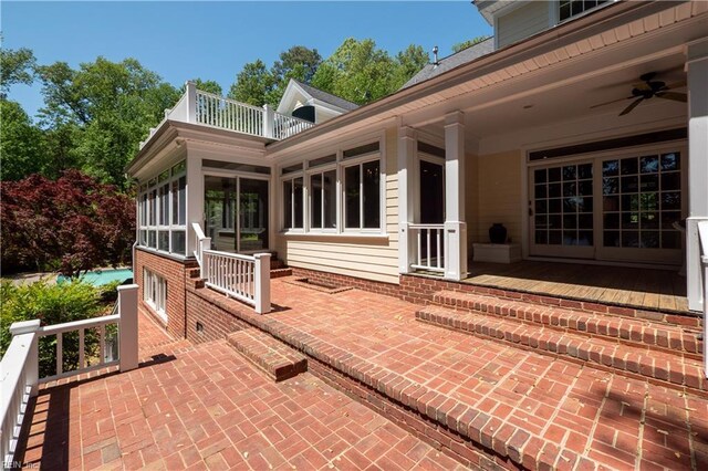 1263 Murphys Mill Rd, Suffolk, VA 23434 - view of patio featuring a sunroom, ceiling fan, and a balcony