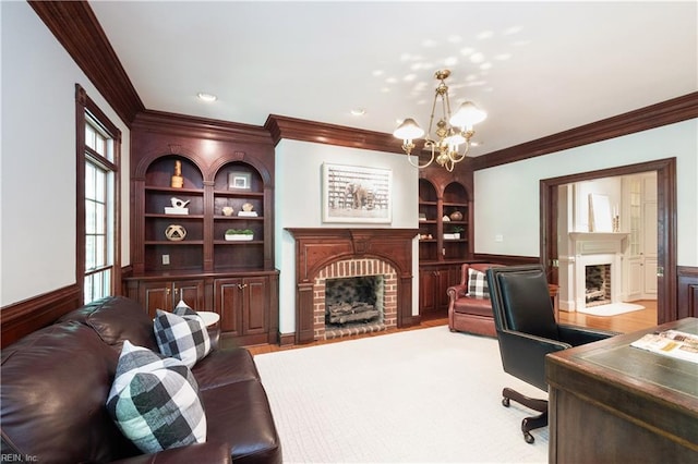 1263 Murphys Mill Rd, Suffolk, VA 23434 - office area featuring an inviting chandelier, ornamental molding, a fireplace, and built in shelves