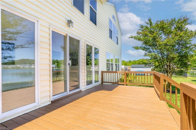 deck featuring a water view