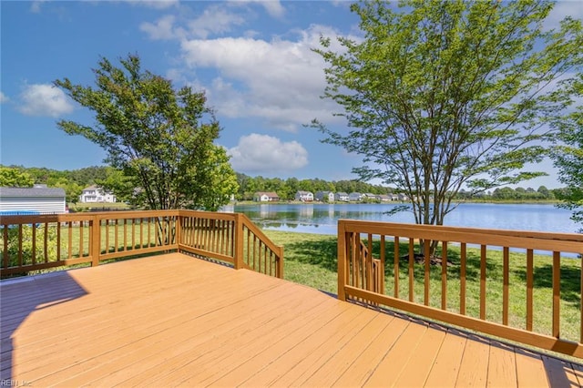 wooden deck with a water view
