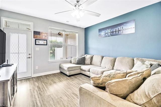 221 Kenny Ln, Smithfield, VA 23430 - living area with baseboards, a ceiling fan, and light wood finished floors