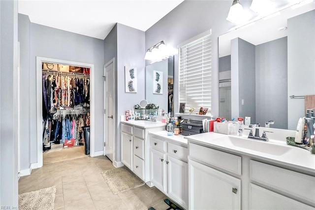 221 Kenny Ln, Smithfield, VA 23430 - bathroom with vanity, tile patterned floors, and a spacious closet