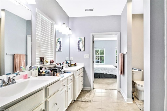 221 Kenny Ln, Smithfield, VA 23430 - full bathroom with visible vents, toilet, baseboards, tile patterned floors, and ensuite bath