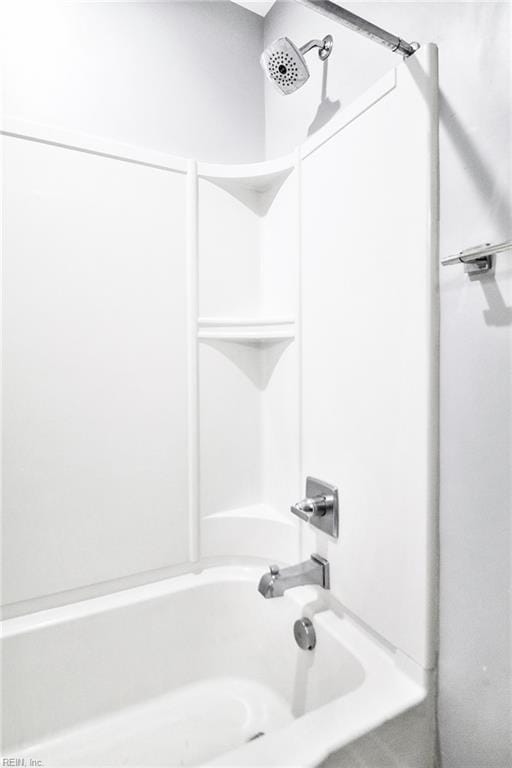 bathroom featuring  shower combination