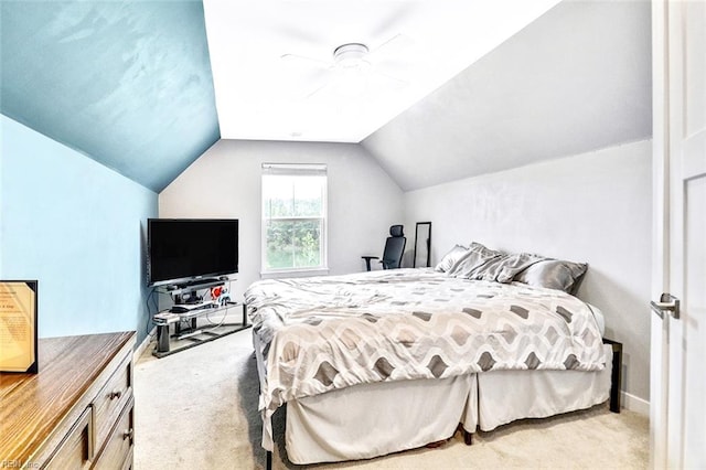 bedroom featuring baseboards, carpet flooring, and vaulted ceiling