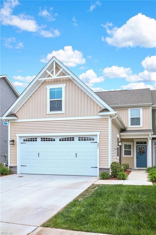 221 Kenny Ln, Smithfield, VA 23430 - craftsman inspired home with an attached garage, board and batten siding, and driveway