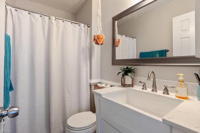 full bathroom with vanity and toilet