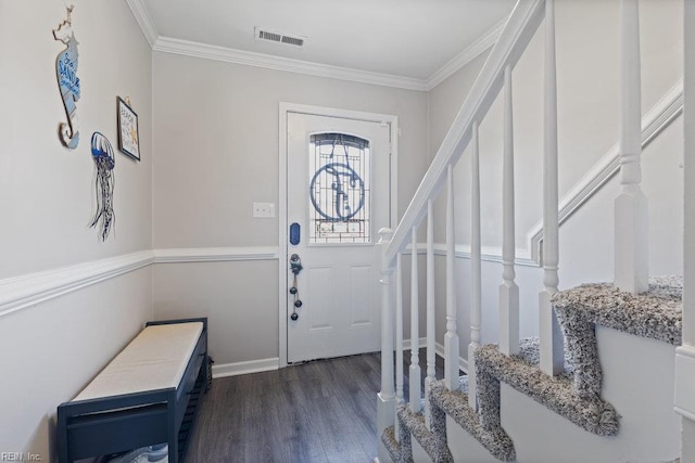 foyer entrance with crown molding, dark wood-style flooring, stairs, and visible vents