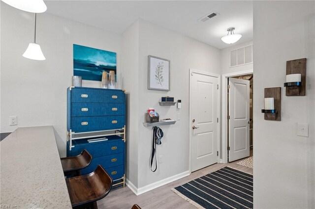 1728 Vankar Dr, Virginia Beach, VA 23456 - entryway featuring visible vents, baseboards, and wood finished floors