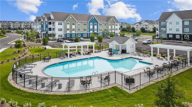 1728 Vankar Dr, Virginia Beach, VA 23456 - pool with fence, a pergola, a patio, a lawn, and a residential view