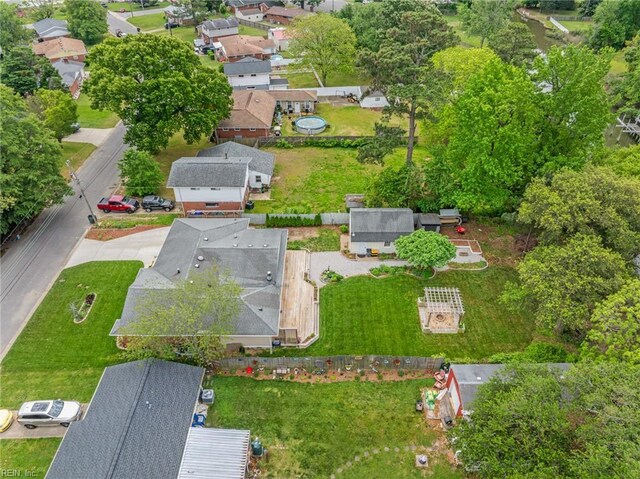 birds eye view of property with a residential view