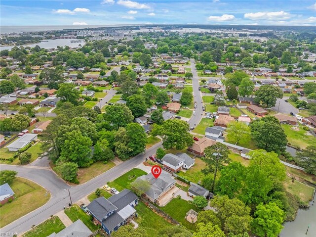 aerial view featuring a residential view and a water view