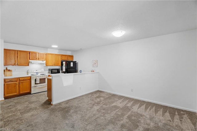 kitchen with baseboards, light countertops, under cabinet range hood, and black appliances