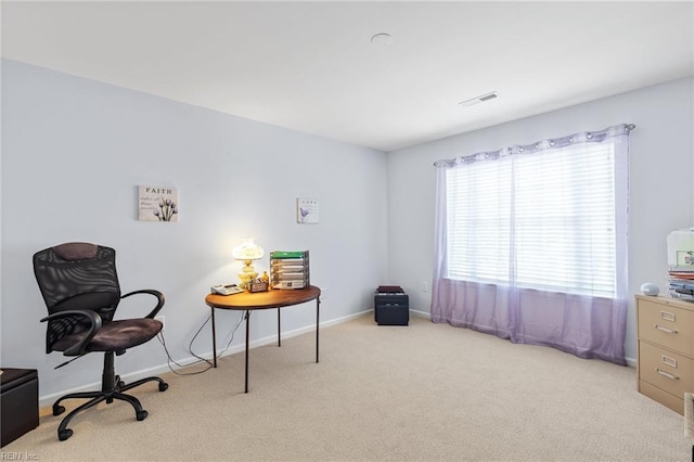 sitting room featuring visible vents, carpet, and baseboards