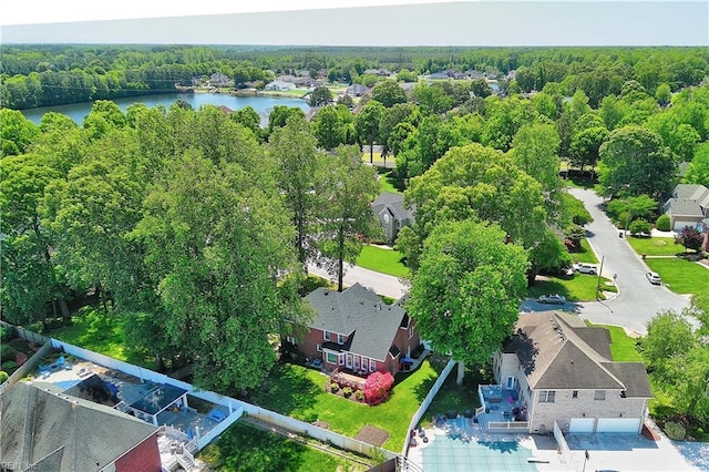 aerial view with a water view, a residential view, and a wooded view