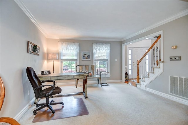 carpeted home office featuring crown molding, baseboards, and visible vents