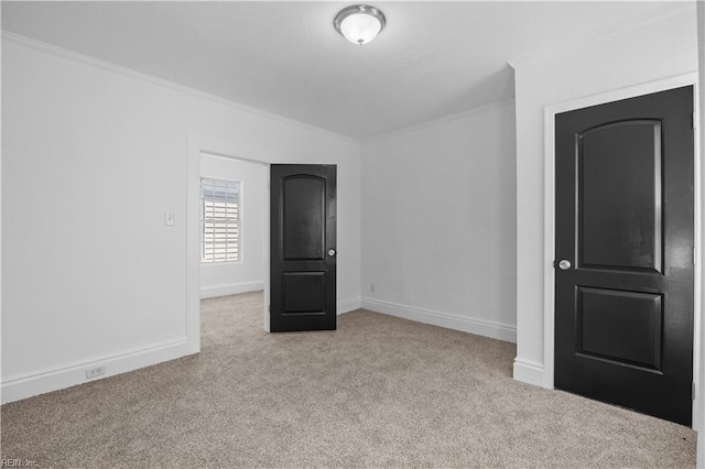 1125 Stewart St, Chesapeake, VA 23324 - unfurnished bedroom with carpet floors, ornamental molding, and baseboards