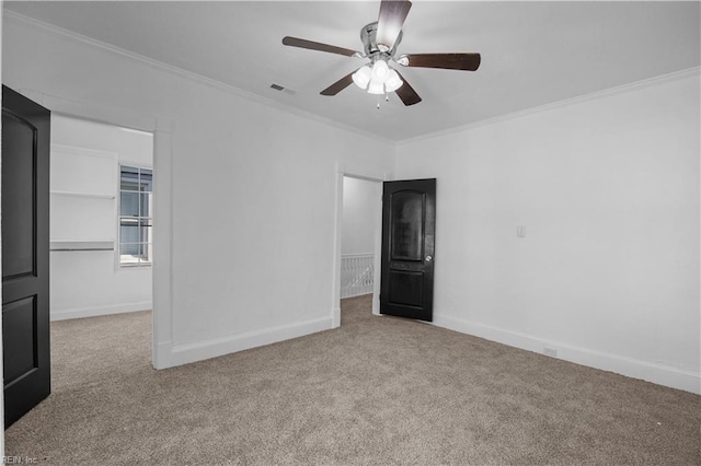 1125 Stewart St, Chesapeake, VA 23324 - carpeted empty room with visible vents, baseboards, crown molding, and ceiling fan
