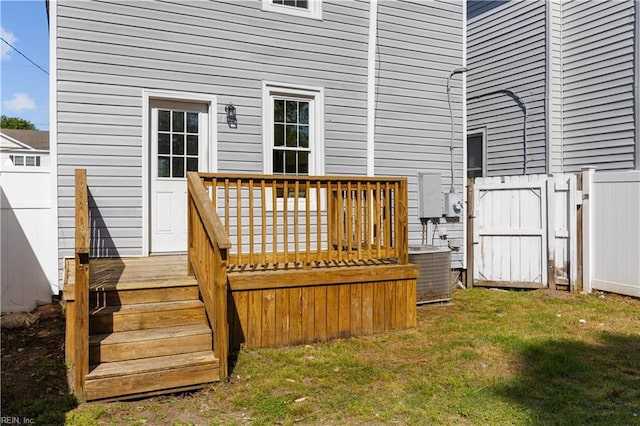1125 Stewart St, Chesapeake, VA 23324 - wooden terrace featuring central air condition unit, fence, and a yard