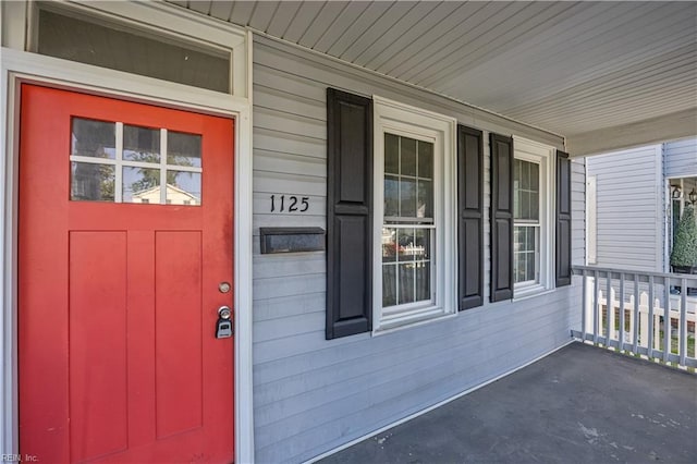 1125 Stewart St, Chesapeake, VA 23324 - view of exterior entry featuring a porch