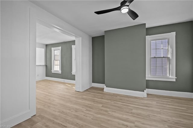 1125 Stewart St, Chesapeake, VA 23324 - empty room with baseboards, ceiling fan, and light wood-style flooring