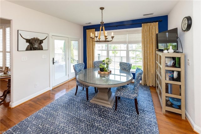 1829 Fury Way, Virginia Beach, VA 23456 - dining room featuring baseboards, an inviting chandelier, wood finished floors, and visible vents