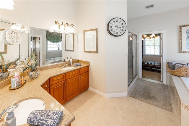 1829 Fury Way, Virginia Beach, VA 23456 - full bath featuring double vanity, a sink, a garden tub, and tile patterned floors