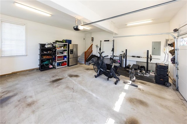 1829 Fury Way, Virginia Beach, VA 23456 - garage featuring a garage door opener, stainless steel fridge with ice dispenser, and electric panel