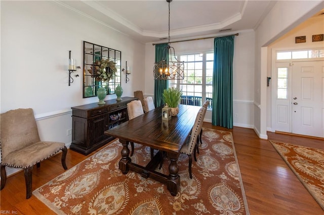1829 Fury Way, Virginia Beach, VA 23456 - dining space with crown molding, wood finished floors, baseboards, a notable chandelier, and a tray ceiling