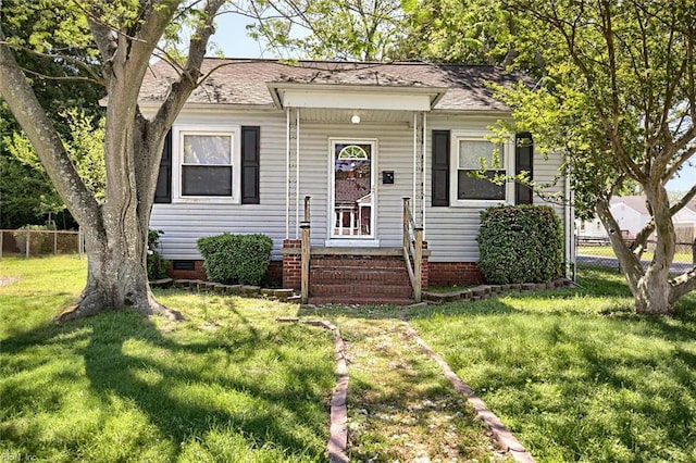 22 Mitchell Rd, Hampton, VA 23669 - view of front of house featuring crawl space, fence, and a front yard