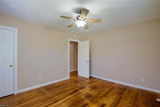 22 Mitchell Rd, Hampton, VA 23669 - empty room featuring baseboards, a ceiling fan, wood-type flooring, and a textured ceiling