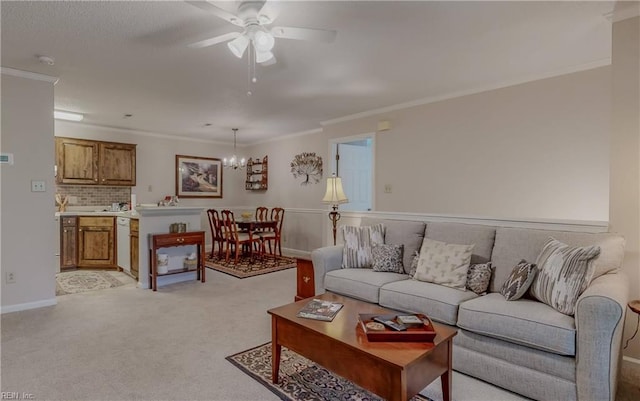living room with crown molding, light carpet, and ceiling fan with notable chandelier