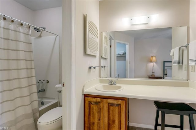 full bath featuring vanity, toilet, and shower / tub combo