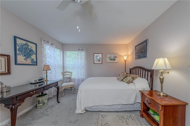bedroom featuring carpet floors and a ceiling fan