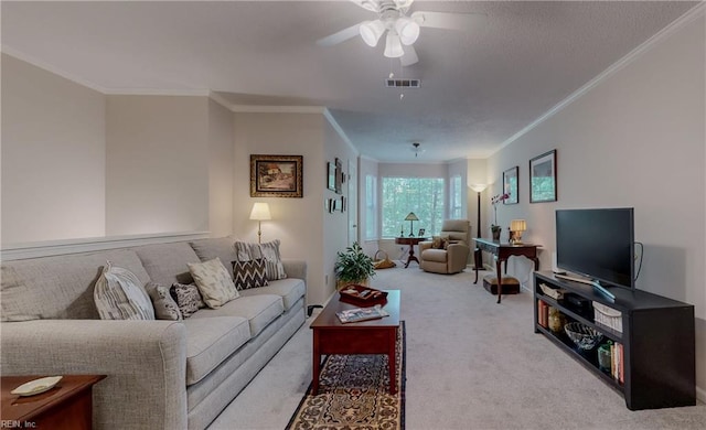 carpeted living area featuring crown molding, ceiling fan, and visible vents