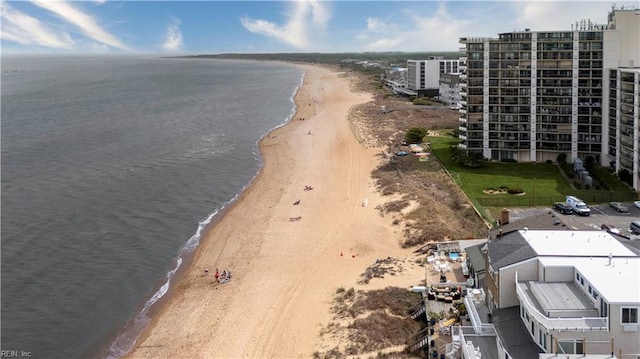 bird's eye view with a water view and a view of the beach