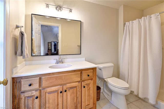 full bathroom with vanity, a shower with shower curtain, tile patterned floors, and toilet