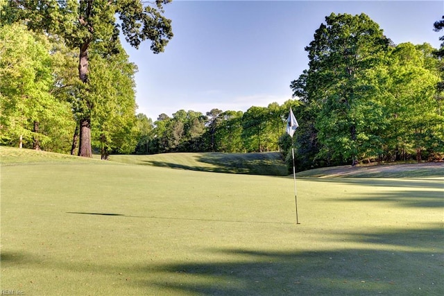 view of home's community with golf course view