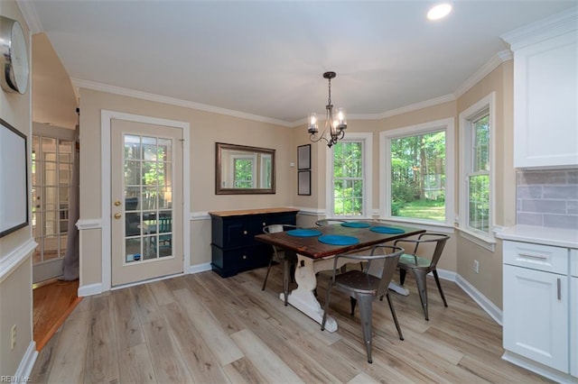 1130 Crystalwood Cir, Chesapeake, VA 23320 - dining area featuring crown molding, a chandelier, light wood-style flooring, recessed lighting, and baseboards