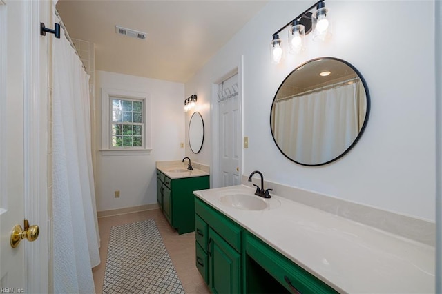 1130 Crystalwood Cir, Chesapeake, VA 23320 - full bath with visible vents, a sink, two vanities, and tile patterned floors