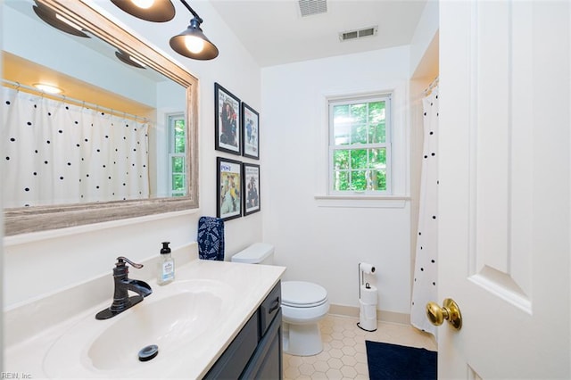 1130 Crystalwood Cir, Chesapeake, VA 23320 - bathroom featuring toilet, visible vents, tile patterned flooring, and vanity