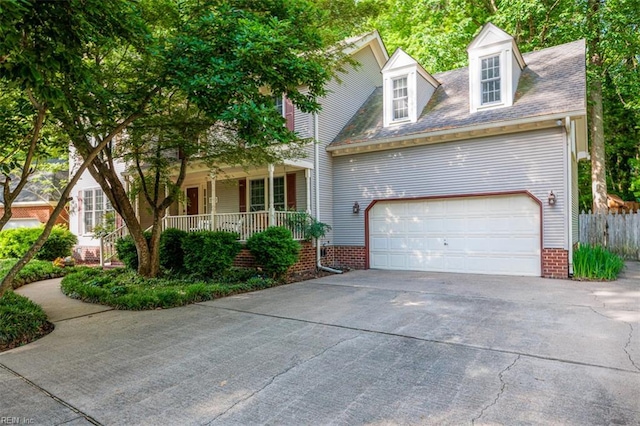 1130 Crystalwood Cir, Chesapeake, VA 23320 - view of front of house with fence, covered porch, an attached garage, and concrete driveway