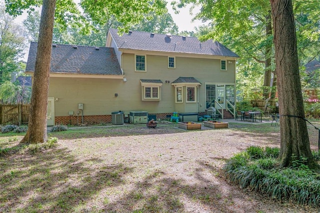 1130 Crystalwood Cir, Chesapeake, VA 23320 - back of house featuring fence, a patio area, a sunroom, and cooling unit