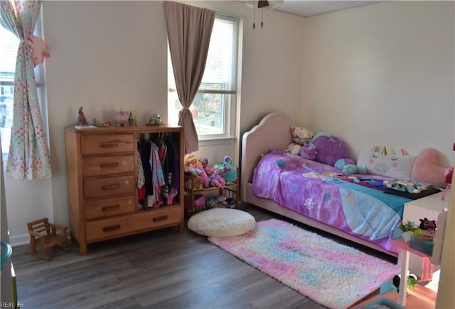 bedroom featuring wood finished floors